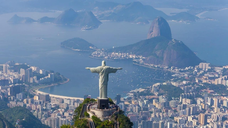 Christ the Redeemer statue overlooking Rio de Janeiro city and coastline