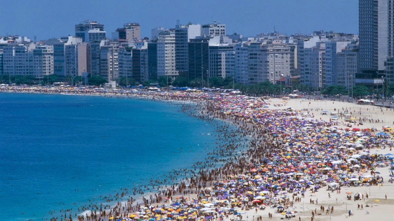 crowded Copacabana Beach with tourists in Rio de Janeiro