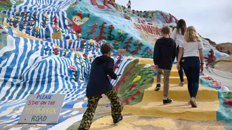 Slab City California Salvation Mountain painted hill visitors