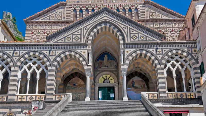 Amalfi Cathedral Duomo di Amalfi front view with grand staircase and historic architecture in the main town square
