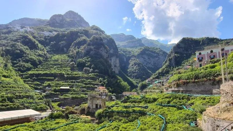 Valley of the Mills Amalfi with green landscape, historic mill ruins, and peaceful walking trail surrounded by nature
