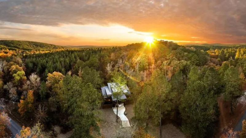Luxury cabin in forest near Broken Bow Lake at sunset in Hochatown Oklahoma