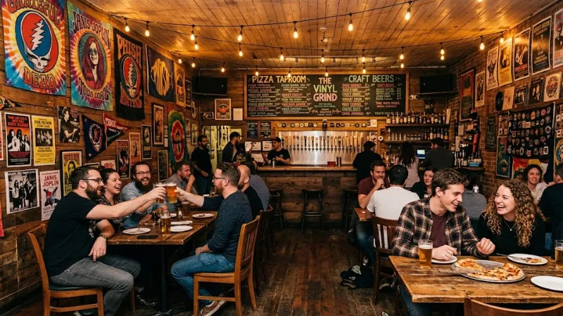 Interior of Grateful Head Pizza taproom in Hochatown with vintage rock posters and Edison bulb lighting