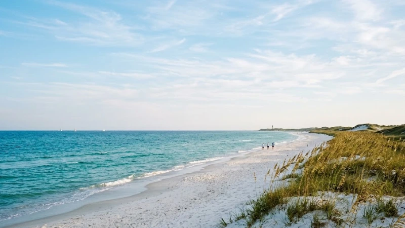 Pawleys Island beach in spring with calm Atlantic surf and open shoreline