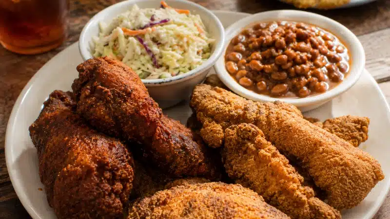 Spicy chicken and fish combo plate at Bolton's in Nashville